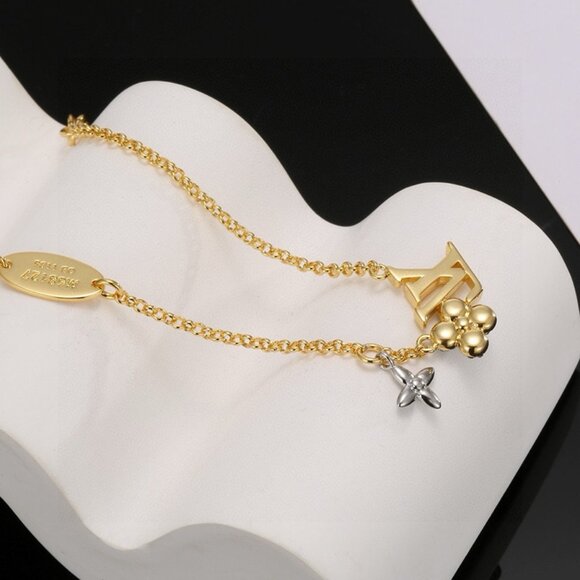 Louis Vuitton Gold-Tone Alphabet Bracelet - Picture 2 of 6